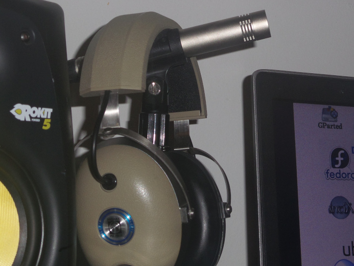 Studio monitor, mic, headphones, and laptop